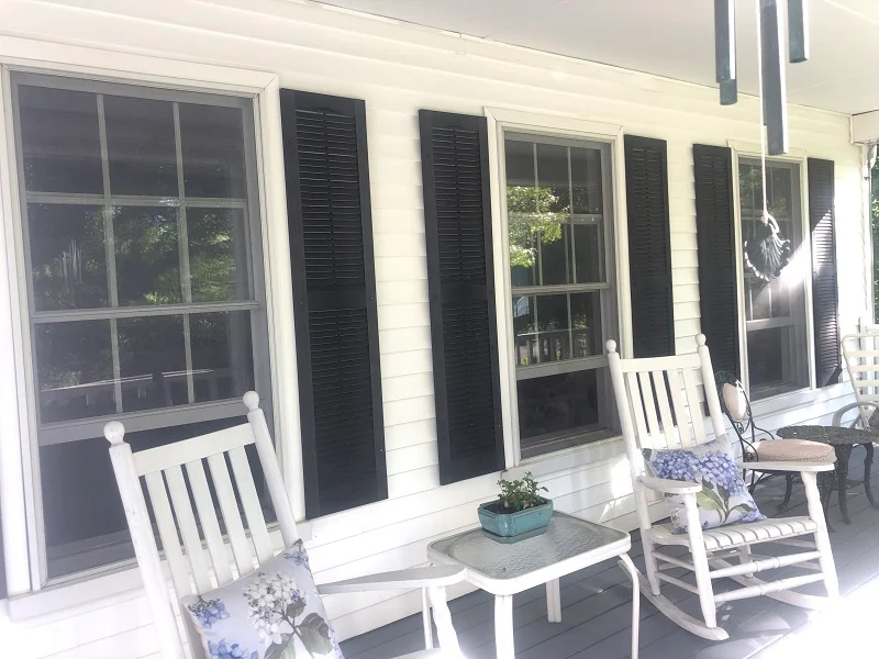 Tall double hung windows on a porch in Cortlandt Manor, NY